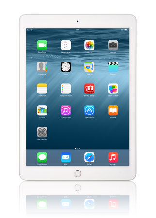 KIEV, UKRAINE - JANUARY 29, 2015: Brand new white Apple iPad Air 2, 6th generation of the iPad, developed by Apple inc. and was released on October 16, 2014のeditorial素材