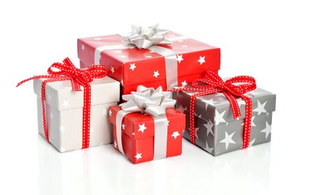 Gift boxes with ribbons isolated on white backgroundの写真素材