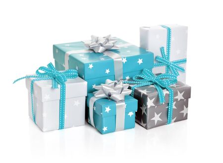 Gift boxes with ribbons isolated on white backgroundの写真素材