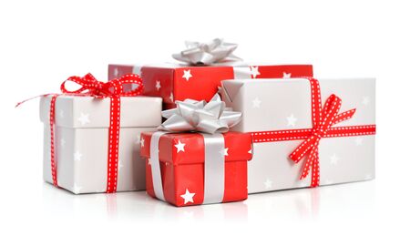 Gift boxes with ribbons isolated on white backgroundの写真素材