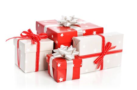 Gift boxes with ribbons isolated on white backgroundの写真素材
