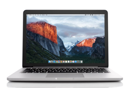 Kiev, Ukraine - May 15, 2016:Brand new Macbook Pro with with Retina display and OS X EL Capitan isolated. MacBook is a brand of notebook computers manufactured by Apple Inc.のeditorial素材