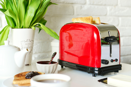 Toaster with bread in kitchen interior closeupの写真素材