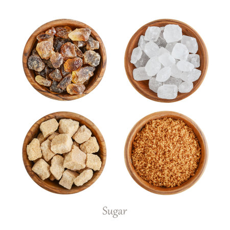 Four different types of sugar in wooden bowls isolated on white background. Top viewの写真素材