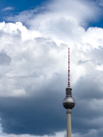 BERLIN, GERMANY - JULY 22, 2023: Alexanderplatz TV tower on the beautiful blue sky background with  clouds.のeditorial素材