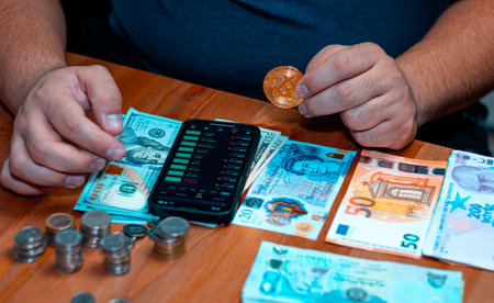 business man holding a coin cost support and saving money financial service concept and saving. High...