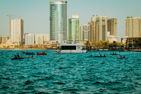 Unidentified people kayaking in Dubai Creek, United Arab Emiratesの写真素材