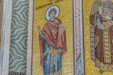 Belgrade, Serbia- 10162024: The Temple Of Saint Sava indoor interior, people pray in an Orthodox church, frescoes on the ceilings and walls of the church. High quality photoの写真素材