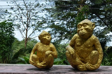 Sculpture of monkeys in national park in Thailandの写真素材
