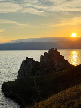 Rock Shamanka on Olkhon Island at sunset, Lake Baikal, Russiaの写真素材