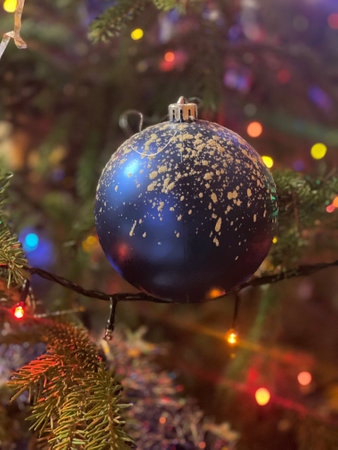 Christmas tree decorated with toys and lights. New Year holidays, bright beautiful lightsの写真素材