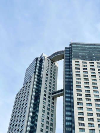 Skyscraper against blue sky in a residential area of Puerto Madero, Buenos Aires, Argentina.