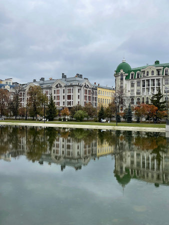 Houses in the center of Kazan reflected in the water of the Black Lake, Russia.の写真素材