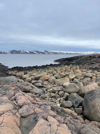 Dragon Beach on the shore of the Barents Sea. Teryberka, Russia.の写真素材