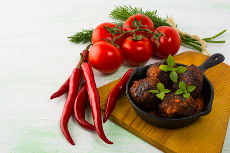 Meatballs in a cast iron skillet. Meatloaf. Grilled meatballs. Meatballs.の写真素材