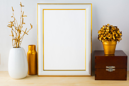 Frame mockup with wooden box. Frame mockup. Poster Mockup. Styled mockup. Product mockup.  Design Mockup. Gold frame mockup. White frame mockup.の写真素材