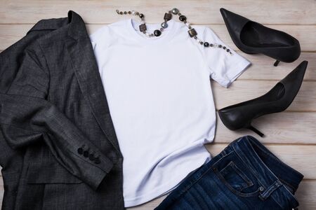 White cotton T-shirt mockup with high heels pointed toe women pumps and gray silk blazer. Design t shirt template, tee print presentation mock upの写真素材