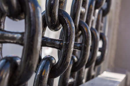 Shined metal black painted chains row. Industrial equipment partsの写真素材