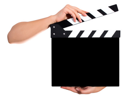 Hands holding a clapper board.Isolated on white backroundの写真素材