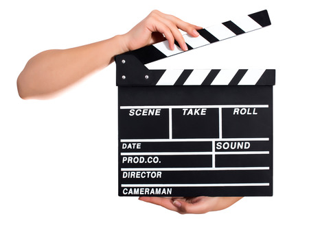 Hands holding a clapper board.Isolated on white backroundの写真素材