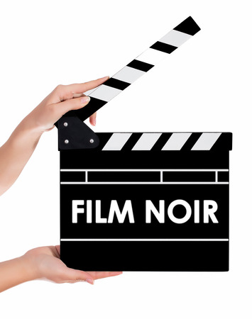 Hands holding a clapper board.Isolated on white backroundの写真素材
