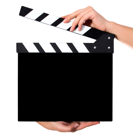 Hands holding a clapper board.Isolated on white backroundの写真素材