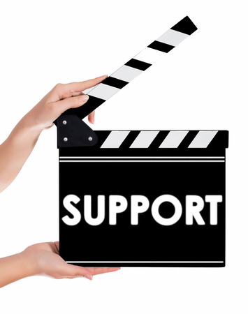 Hands holding a clapper board.Isolated on white backroundの写真素材