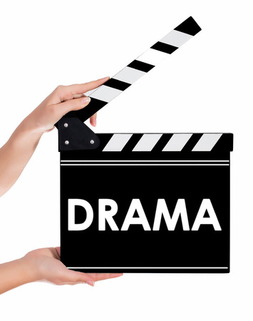 Hands holding a clapper board.Isolated on white backroundの写真素材