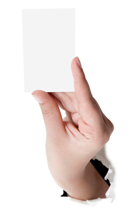 Closeup shot of a woman hand holding blank business card isolated on white background. Close up hand showing visit card.の写真素材