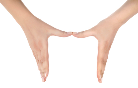 Stretched hand of woman isolated over white background. Open palm hand gesture of woman hand. Close up of open palm isolated over white background.の写真素材