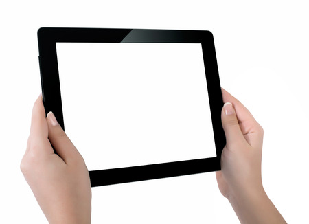 Hand holding a tablet computer with white screen. Woman hands showing empty screen of modern digital tablet. Hand holding tablet pc isolated on white background with blank screen.の写真素材