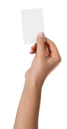Woman hand hold virtual business card, credit card or blank paper isolated on white background.Clipping path included.Hand holding blank business card with clipping pathsの写真素材