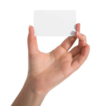 Woman hand hold virtual business card, credit card or blank paper isolated on white background.Clipping path included.Hand holding blank business card with clipping pathsの写真素材