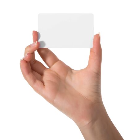 Woman hand hold virtual business card, credit card or blank paper isolated on white background.Clipping path included.Hand holding blank business card with clipping pathsの写真素材