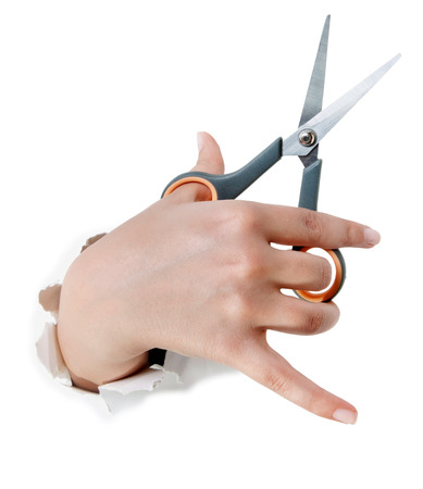 hand holding thinning scissors shear in hand isolated on white background.の写真素材