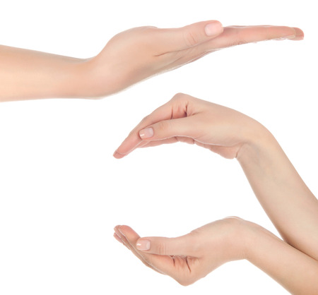 Close-up of beautiful woman's hand, palm up. Isolated on white backgroundの写真素材