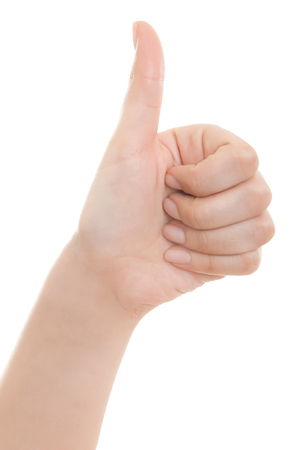 Female hand showing thumb up ok all right victory hand sign gesture. Gestures and signs. Body language on white backgroundの写真素材