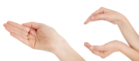 Close-up of beautiful woman's hand, palm up. Isolated on white backgroundの写真素材