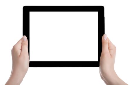 Hand holding a tablet computer with white screen. Woman hands showing empty screen of modern digital tablet. Hand holding tablet pc isolated on white background with blank screen.の写真素材