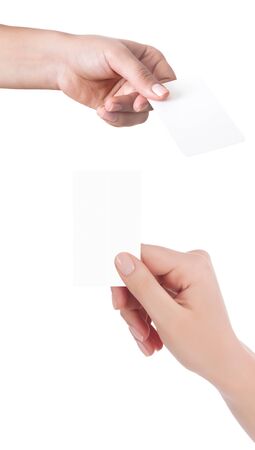 Woman hand hold virtual business card, credit card or blank paper isolated on white background.Clipping path included.Hand holding blank business card with clipping pathsの写真素材