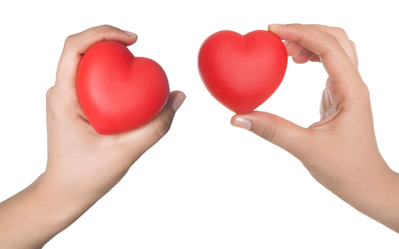 hand holding blank business card with clipping paths.Valentine's day greeting card isolated on whiteの写真素材