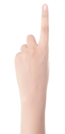 Woman hand pointing up with index finger or touching screen back hand side isolated on white background.の写真素材