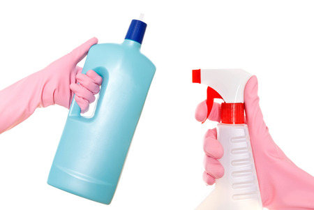 Hand in gloves with rubber window cleaner. Isolated on a white backgropund.の写真素材
