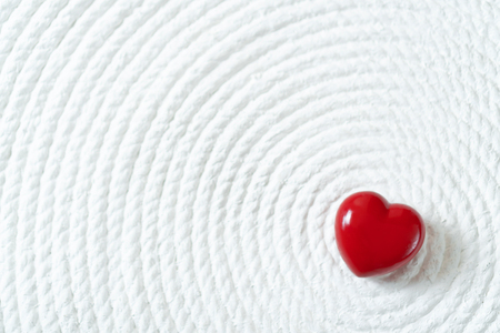 Red Candy Heart on White Backgroundの写真素材