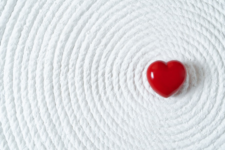 Red Candy Heart on White Backgroundの写真素材