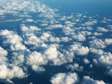 White clouds over blue sky. above viewの写真素材