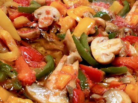 colorful sauce with mushrooms peppers and tomatoesの写真素材