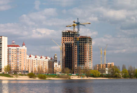 Building of new house on the lake coastの写真素材
