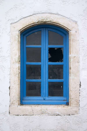 broken window in old house