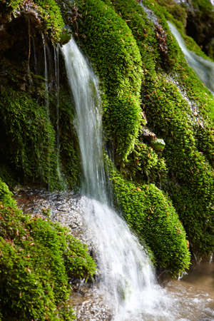 Waterfall betwiin stones on a mountains riverの写真素材